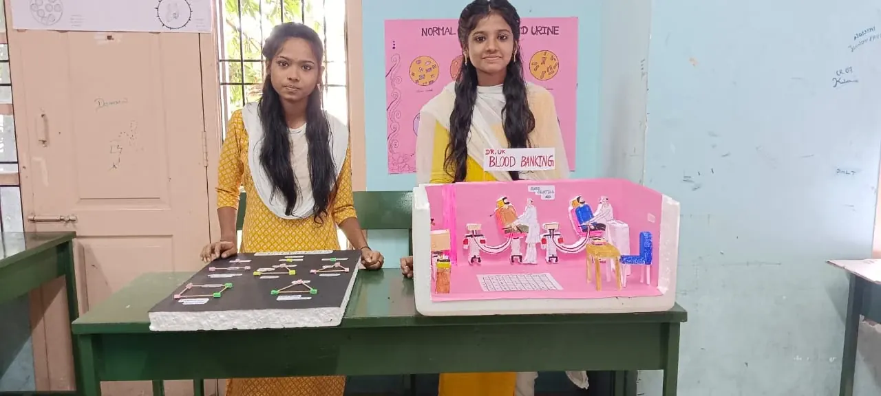 Student academic model presentation during a DR UK exhibition