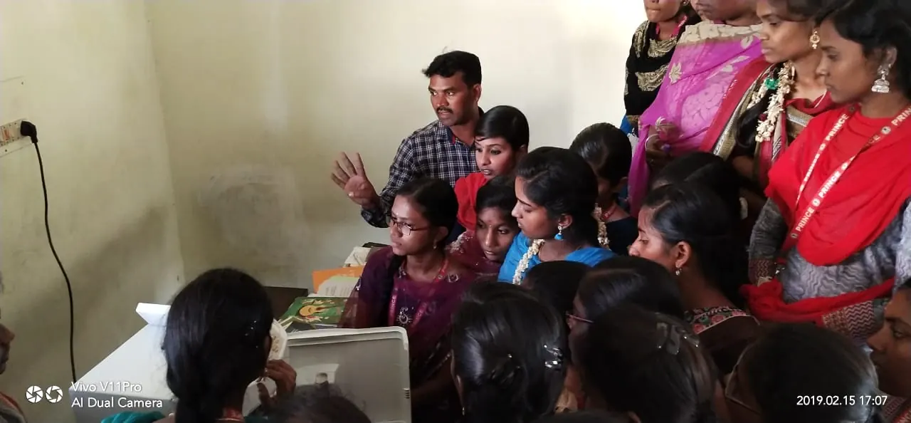 Students observing a guided practical demonstration during institute training