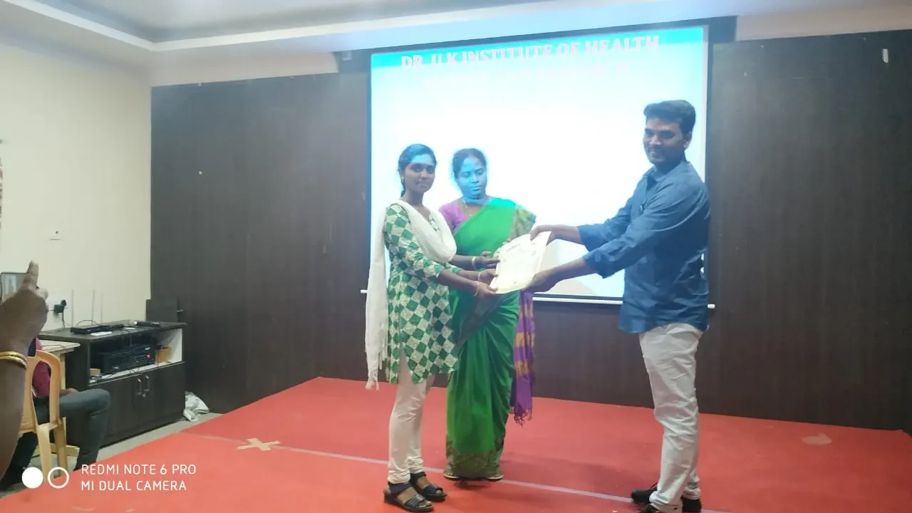 Certificate presentation during an official DR UK Institute student event