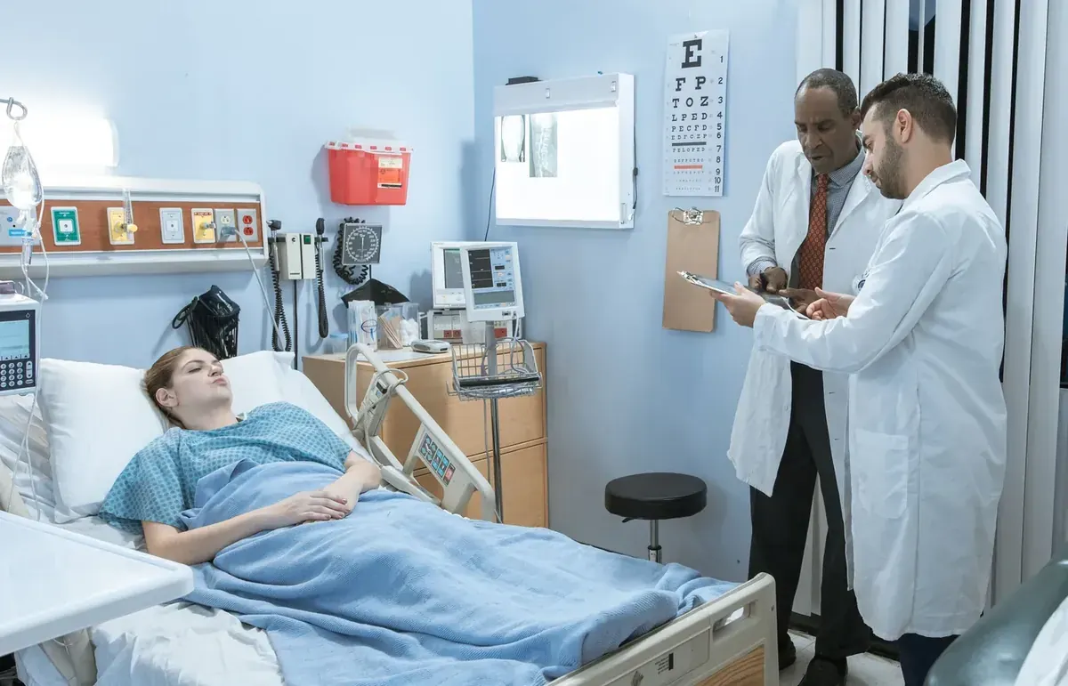 Healthcare professional supporting a supervised patient consultation